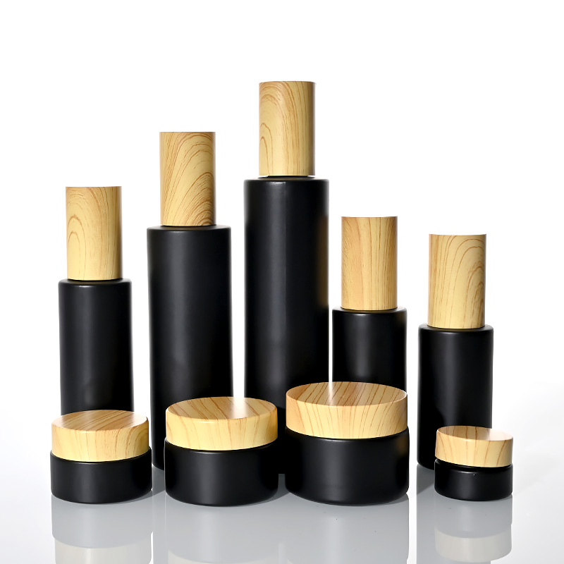 25ml 30ml 40ml 50ml 80ml 100ml Flat Shoulder Matte Black Lotion Bottle Emulsion Glass Pump Bottle with Plastic Wooden Lid